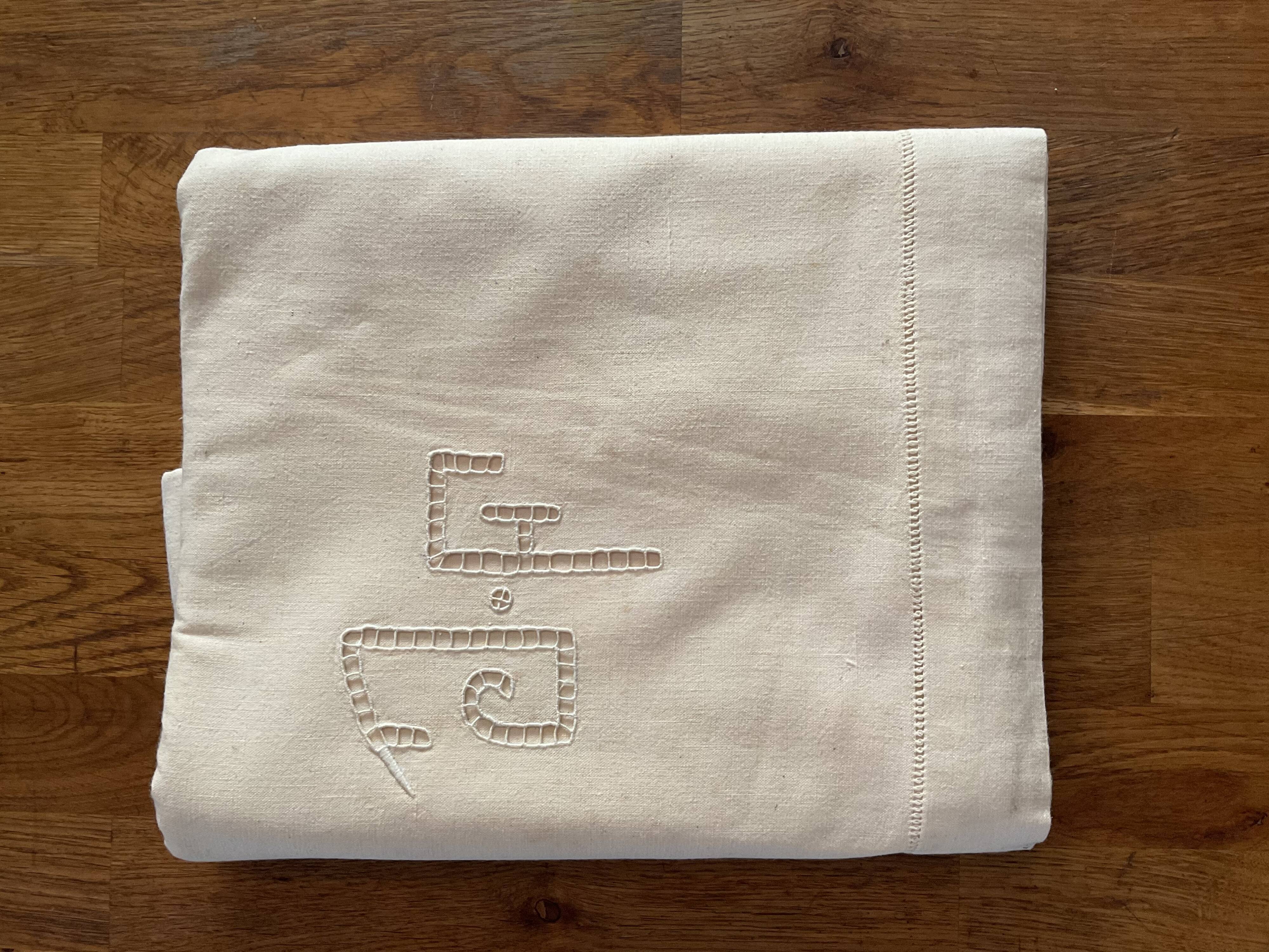 Old embroidered sheet monogram