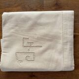 Old embroidered sheet monogram