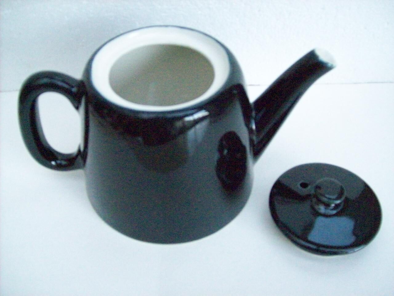 Vintage black ceramic teapot