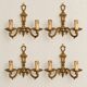 Set of four two-light wall sconces in gilded brass — Louis XVI style
