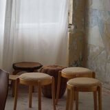 Modern Swedish, set of 14 stackable stools in birch and hessian fabric, 1980s.