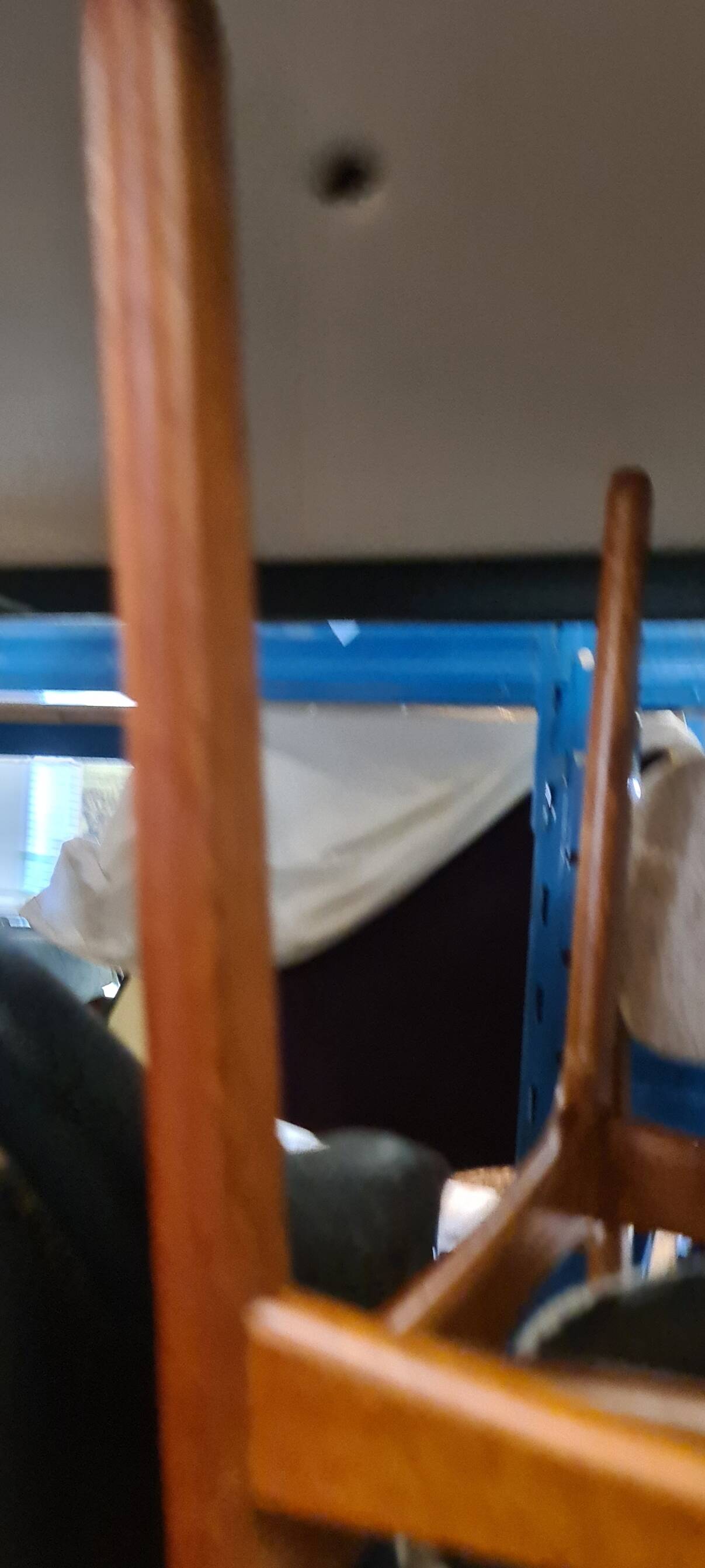 A set of four vintage teak dining chairs