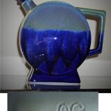 Advertising bottle "denbac" for the serres distillery in toulouse
