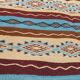 Multicolored hand-woven Berber rugs in natural wool