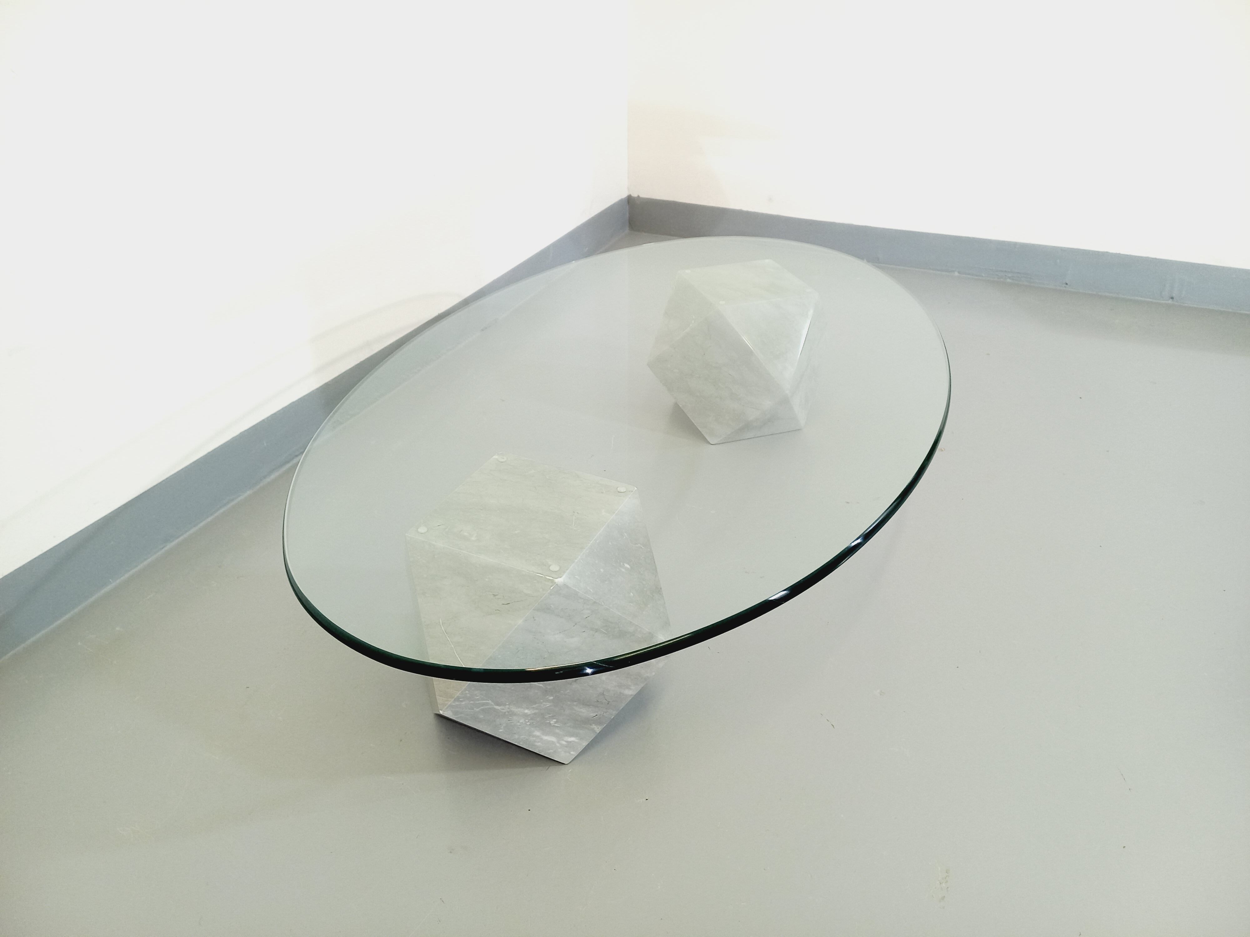 Vintage vignelli oval italian coffee table for casigliani in marble and glass from the 70s