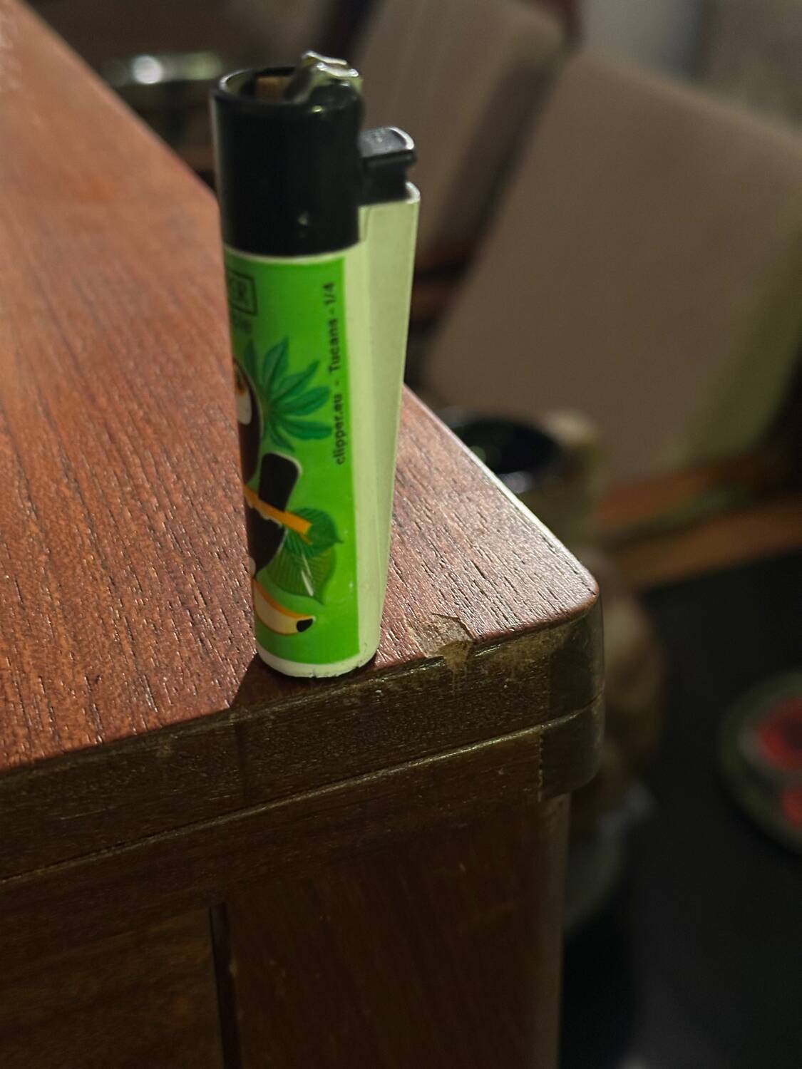 Extendable teak and teak veneer dining table