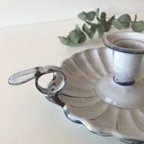 Candlestick in white enameled metal