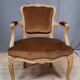 Brown Louis XV style armchair