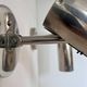 Pair of modernist adjustable wall lights, chrome metal, France 1960
