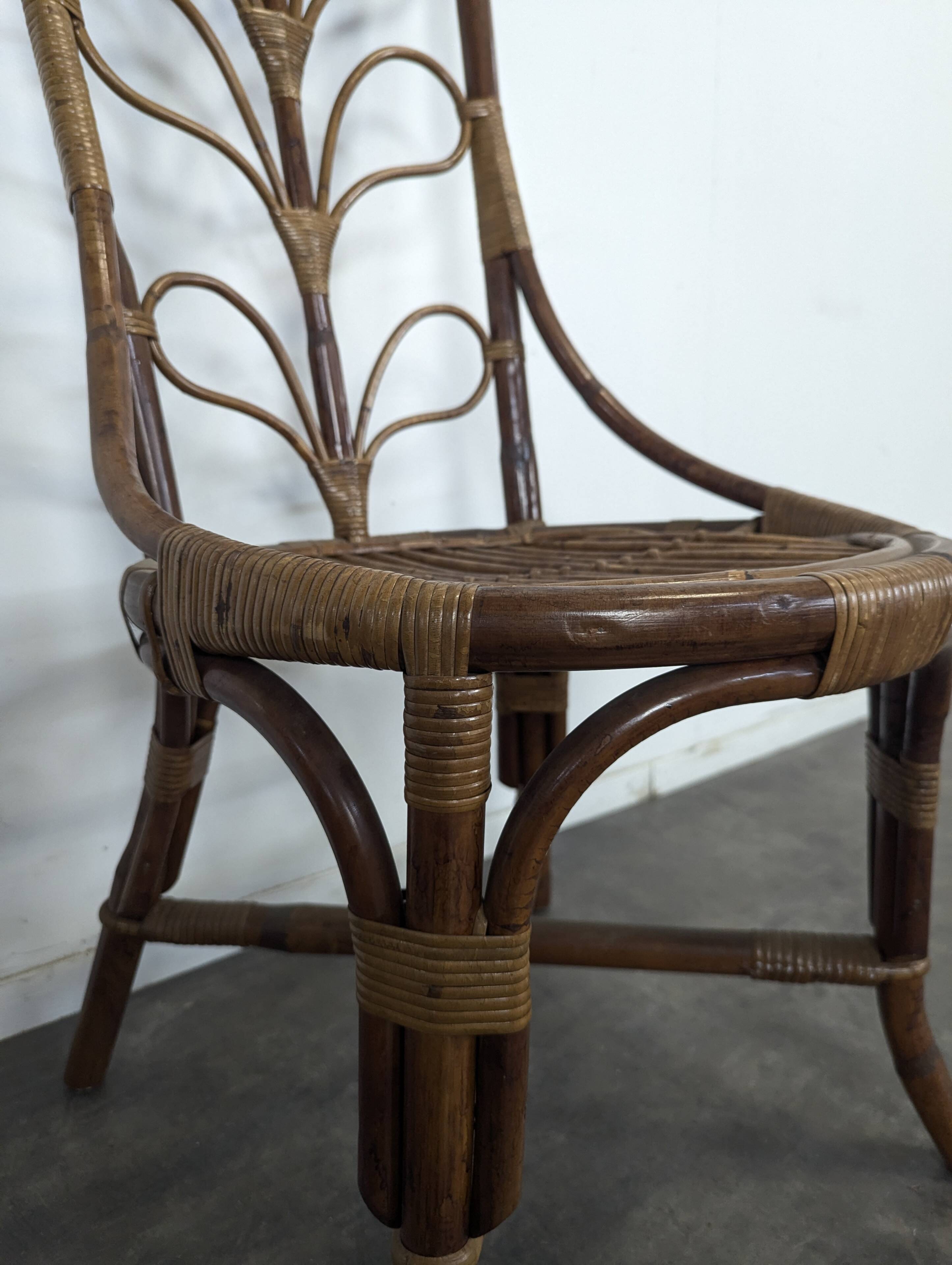 Set of 4 bamboo and rattan chairs with sunflower decoration.