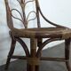 Set of 4 bamboo and rattan chairs with sunflower decoration.