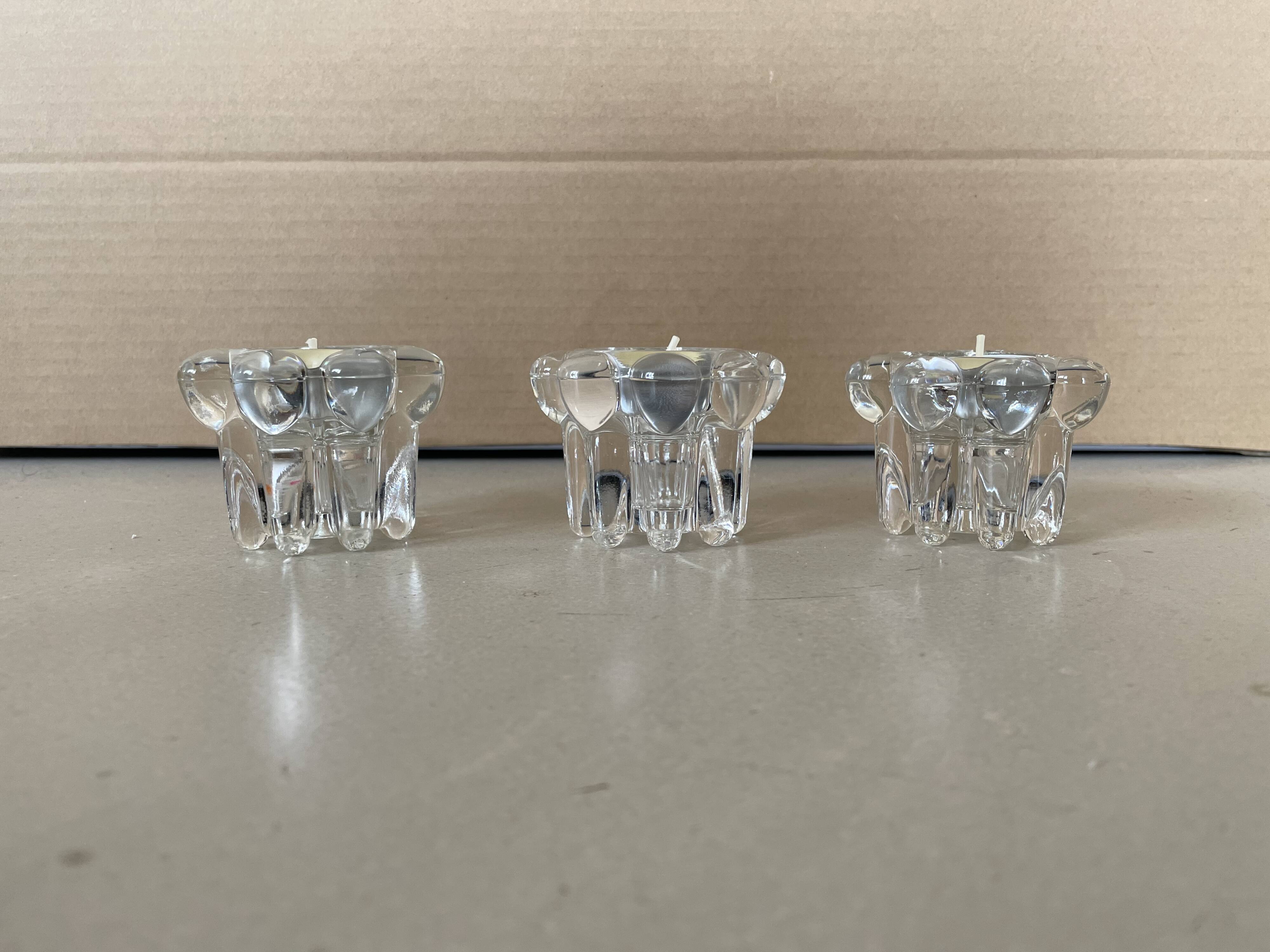 Set of 3 old glass candlesticks