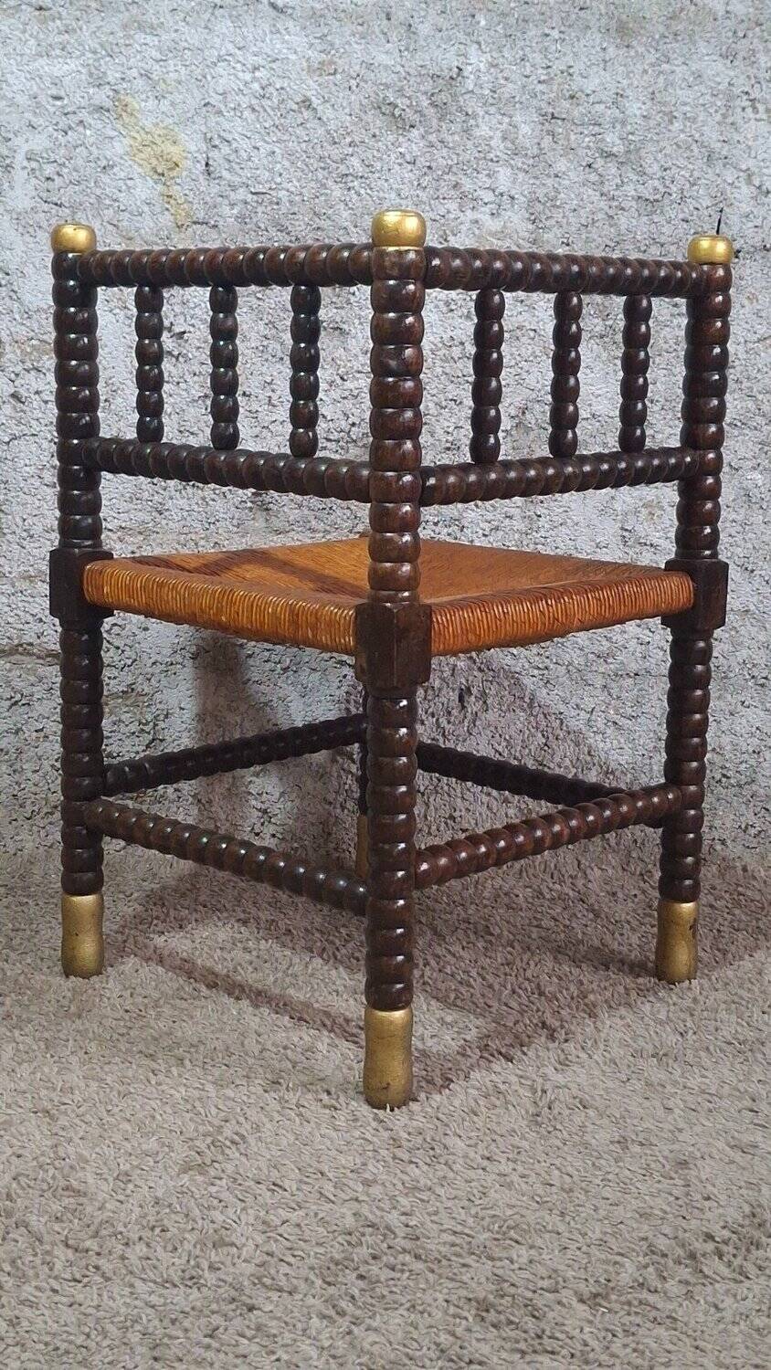 Fireplace corner chair in Louis XIII style, turned wood with braided rush, 19th century.