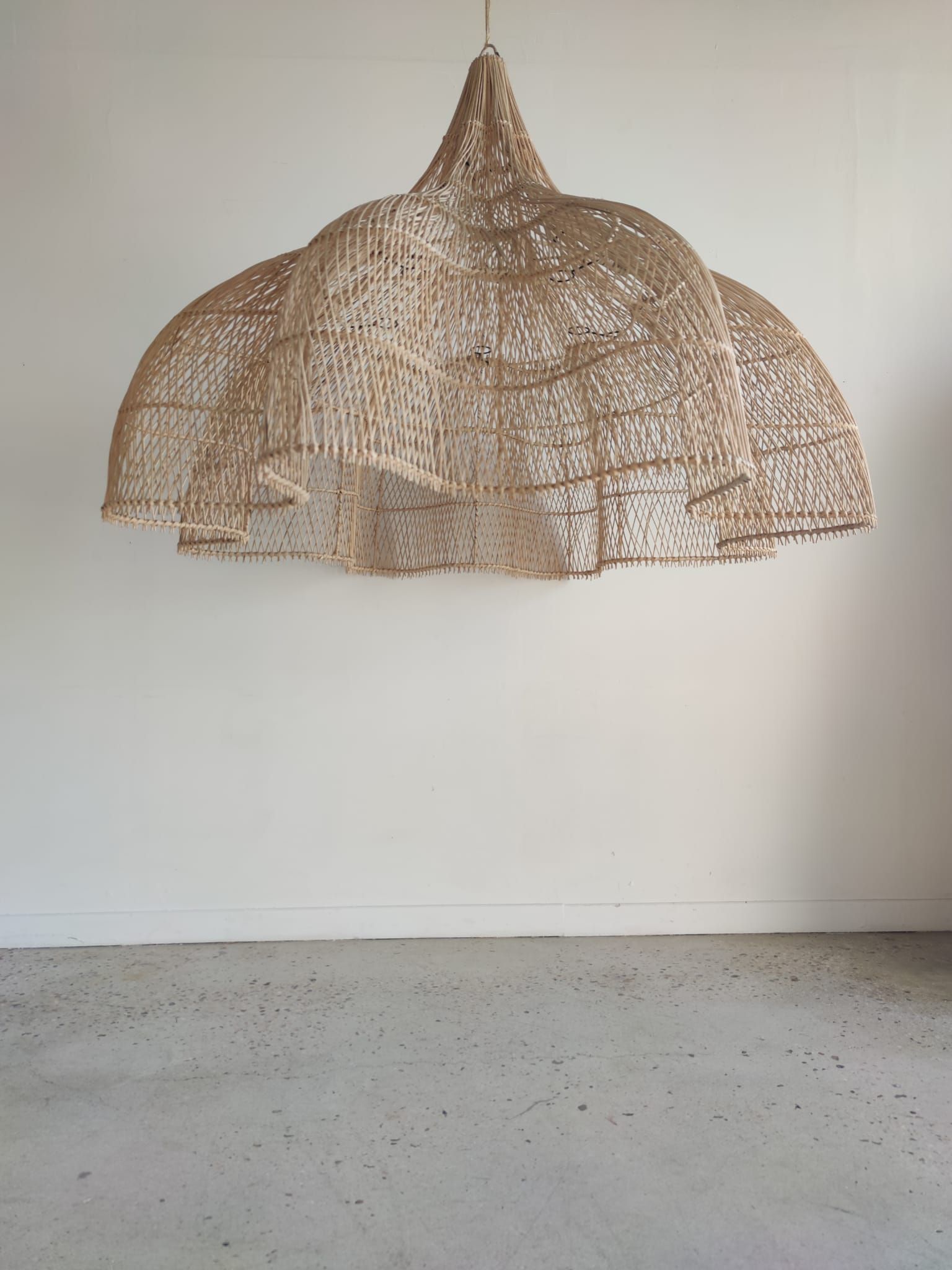 Huge rattan suspension in the shape of a corolla H:1m; D: 1m50