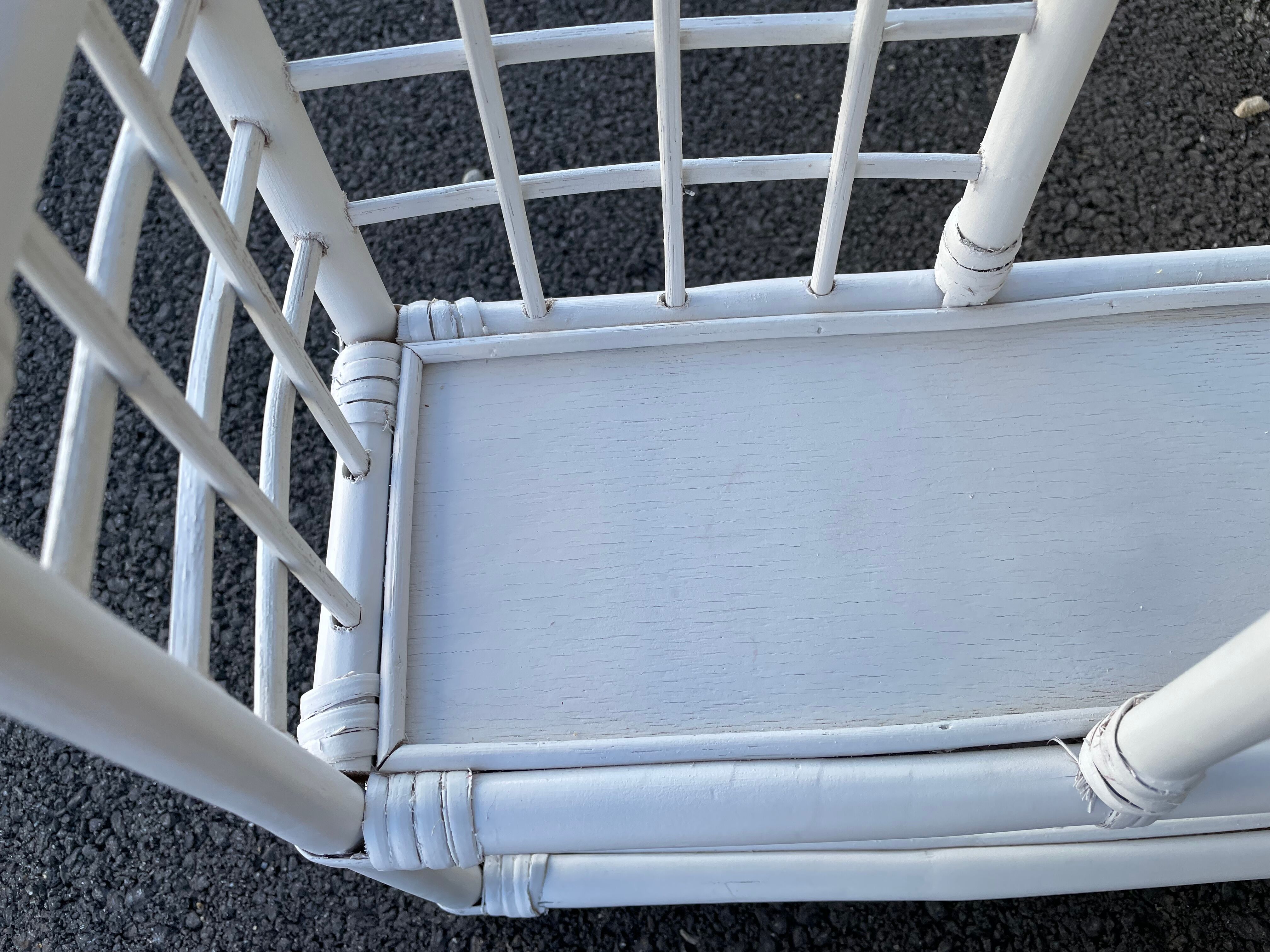 White rattan shelf with braces
