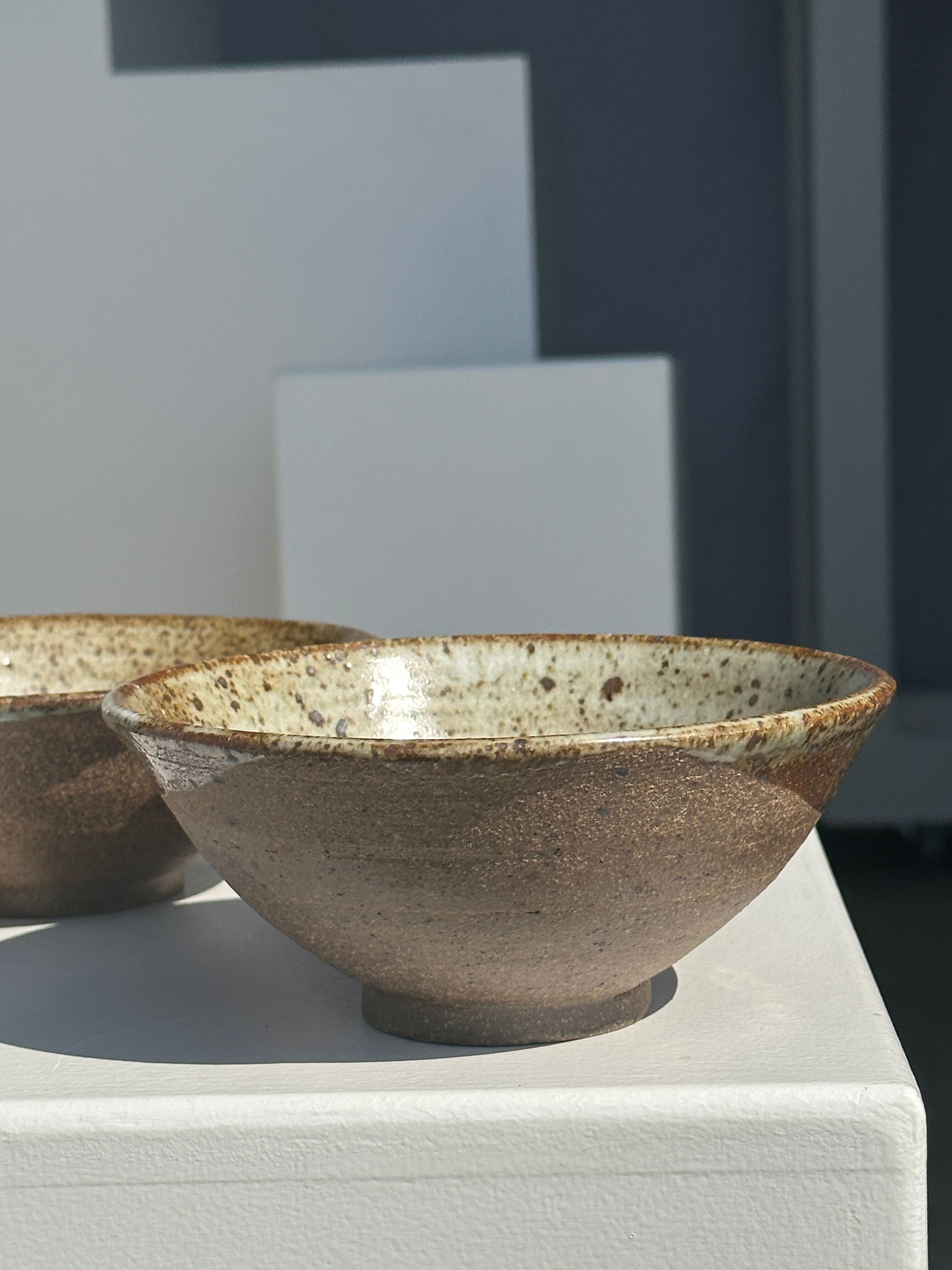 Duo of ceramic bowls interior glazed exterior matt raw earth