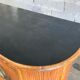 Rattan and wood bar with its decorative brass portholes