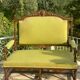 Richly carved solid wood bench in Louis XVI style.