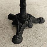 Bistro table with cast iron base and teak top