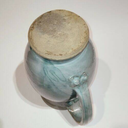 Red and grey glazed stoneware pitcher Signed Height 21 cm