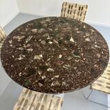 Old marble dining table with metal tulip base from the Italian design in the 60s