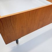 Double bed vintage modernist in teak and black metal from the 1960s with bedside tables.