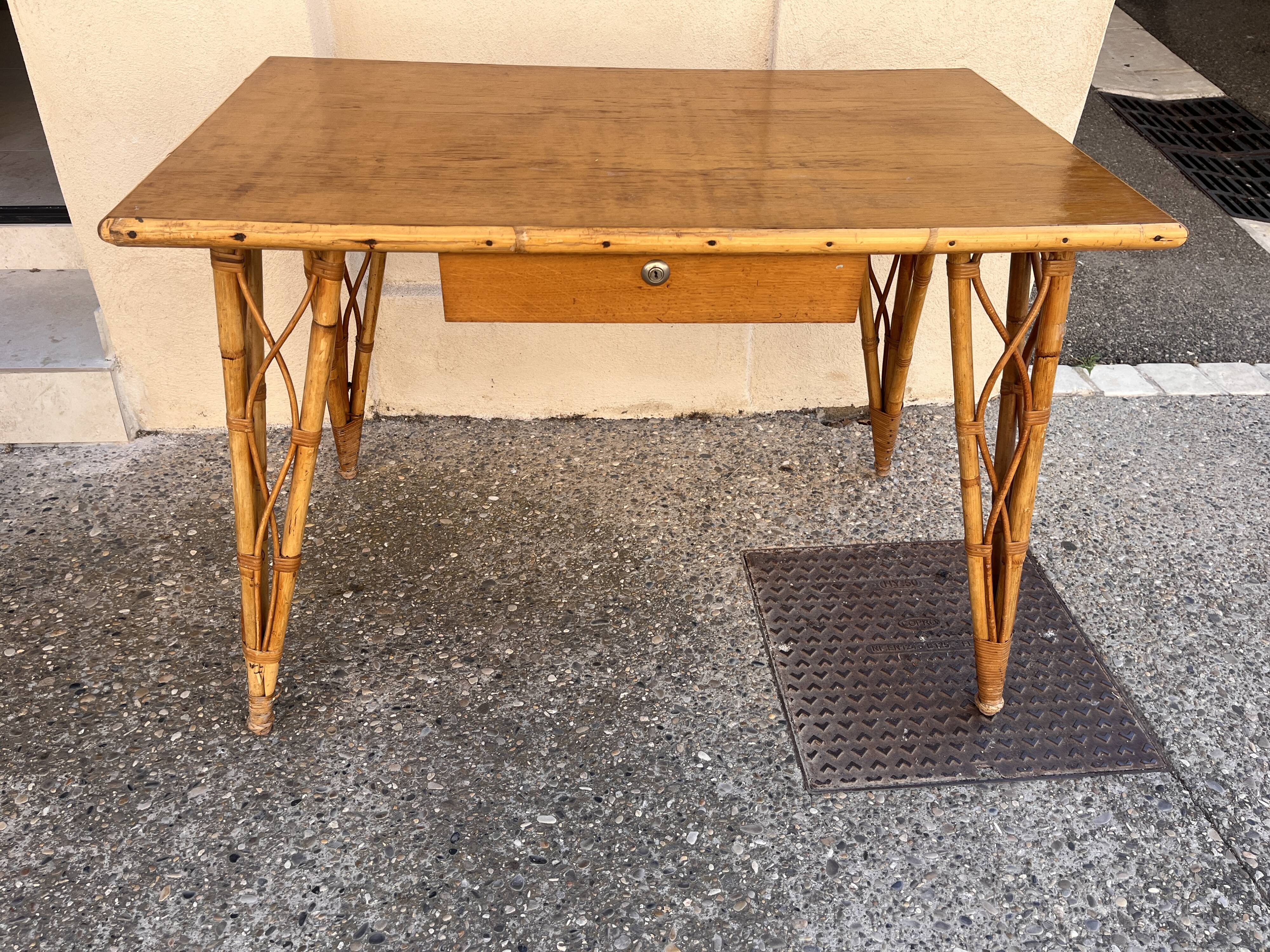 vintage 1960s rattan desk with Eiffel Tower legs