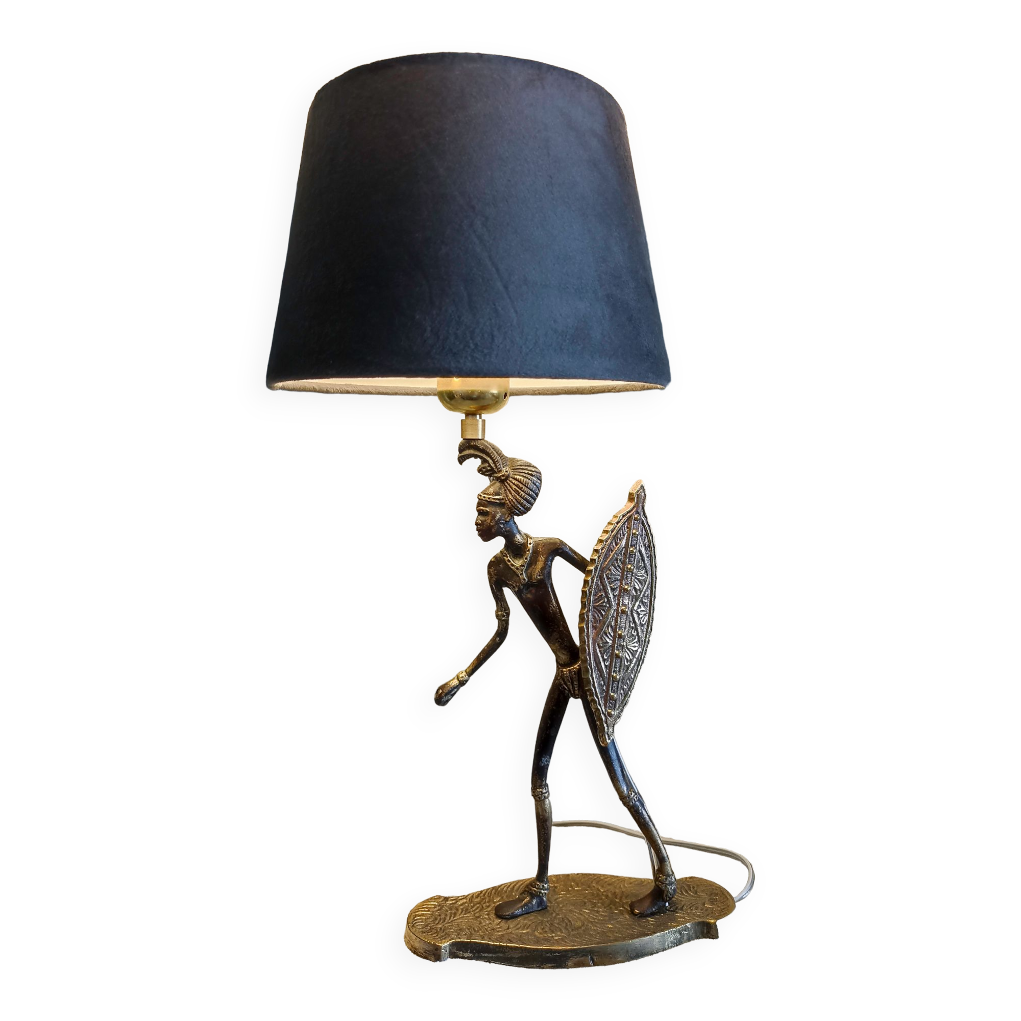 African warrior lamp in bronze.