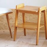 Bedside or side table with compass legs.