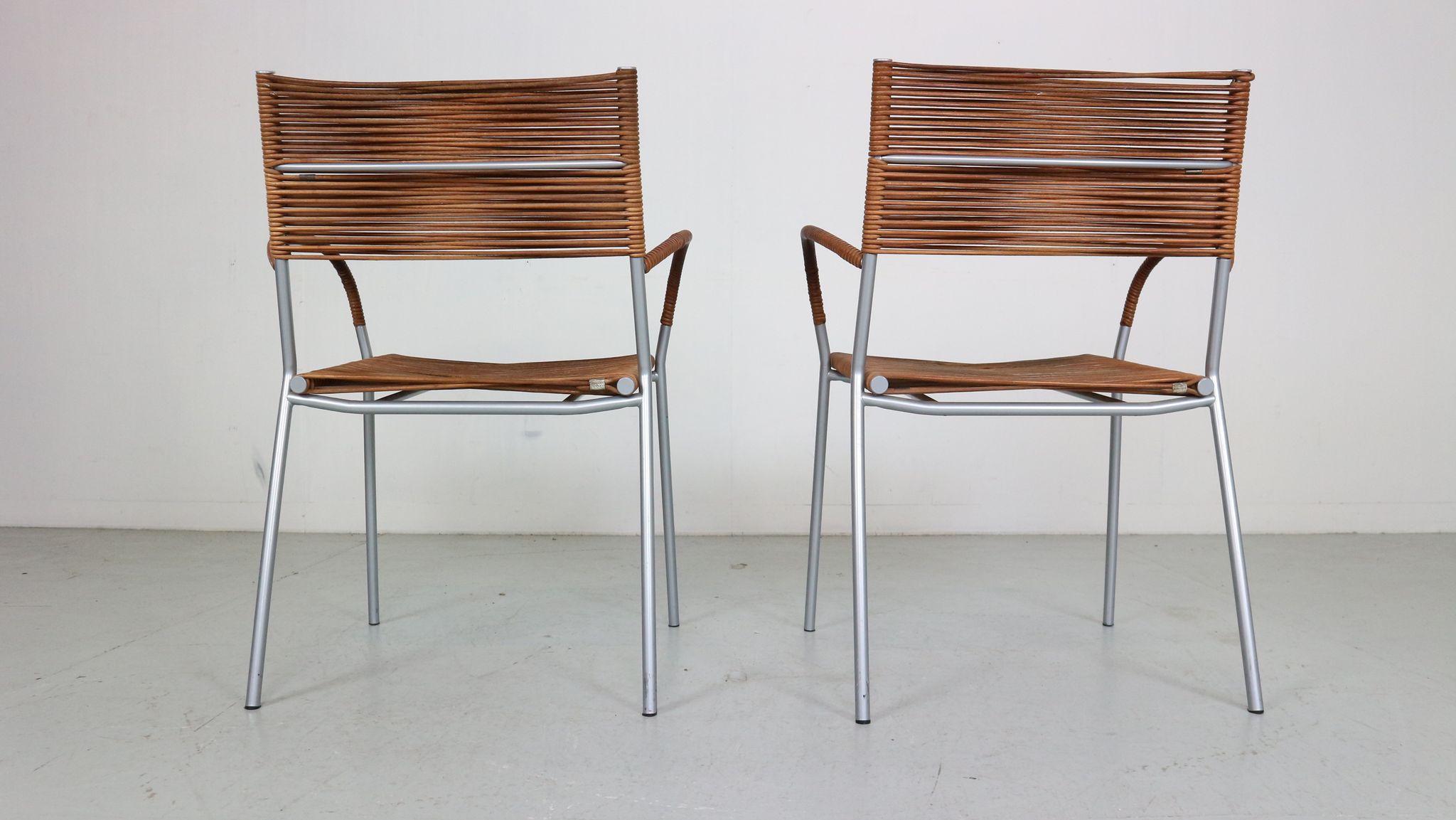 Set of 2 leather Mis B2 RVS armchairs by Tito Agnoli  for Pierantonio Bonacina