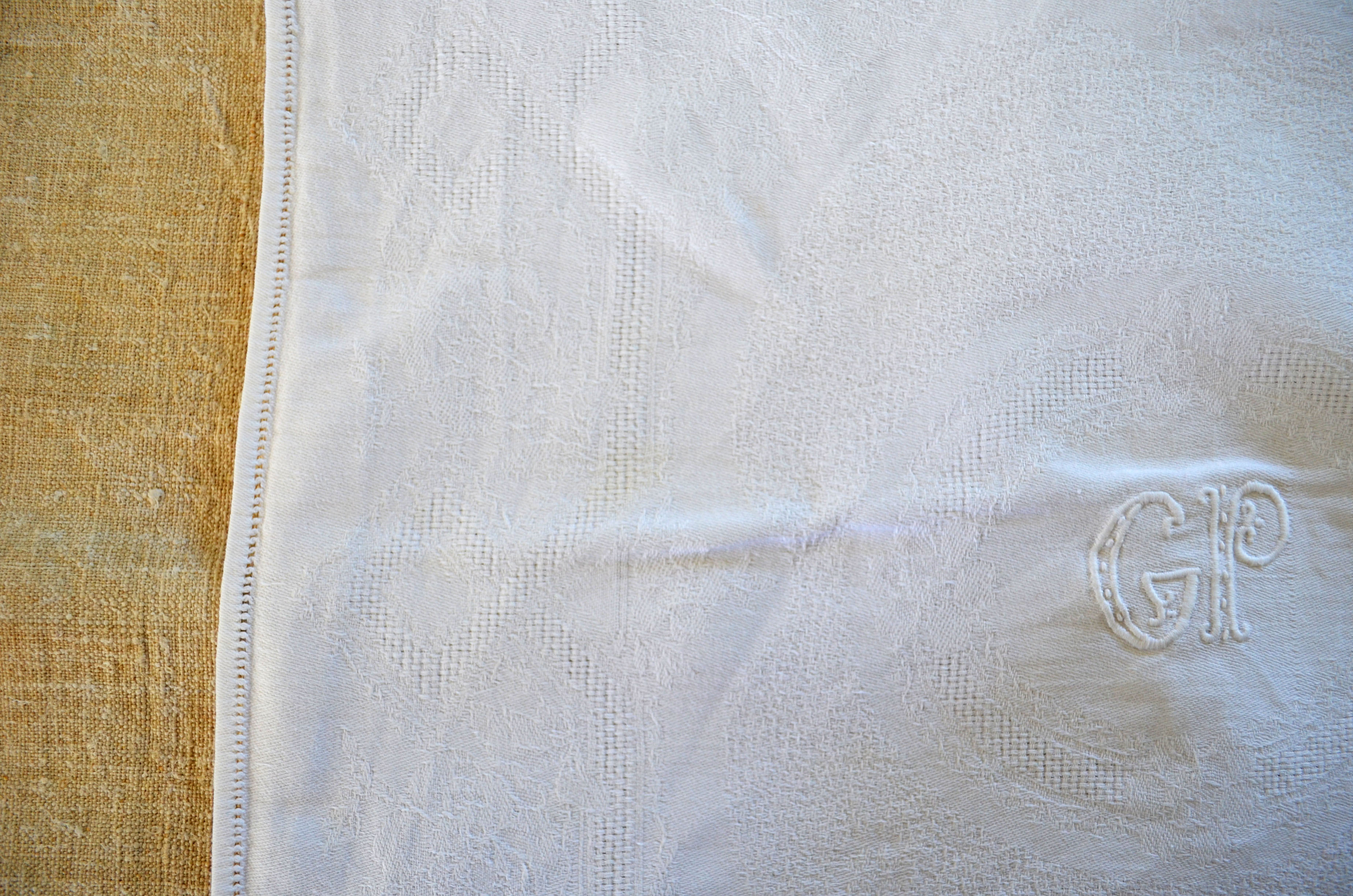 Set of 12 hand-embroidered cotton damask napkins