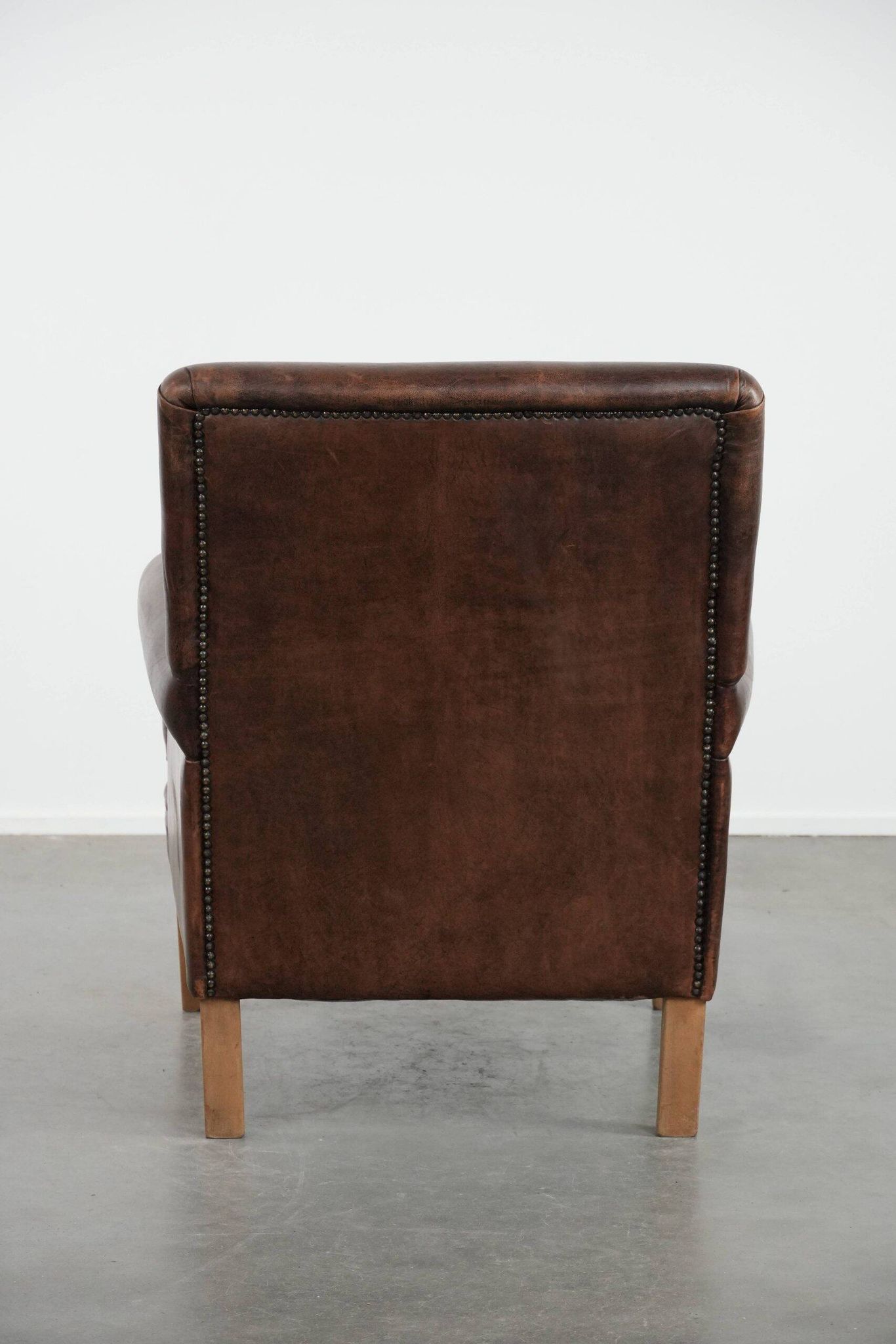 Beautiful Characterful Sheep Leather Armchair with a Deep Colour