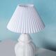 Vintage table lamp in woven ceramic Regency style.