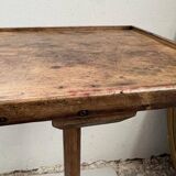 Old primitive wooden tripod pedestal table