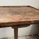 Old primitive wooden tripod pedestal table