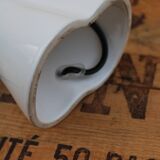 Hand-shaped lamp and opaline globe