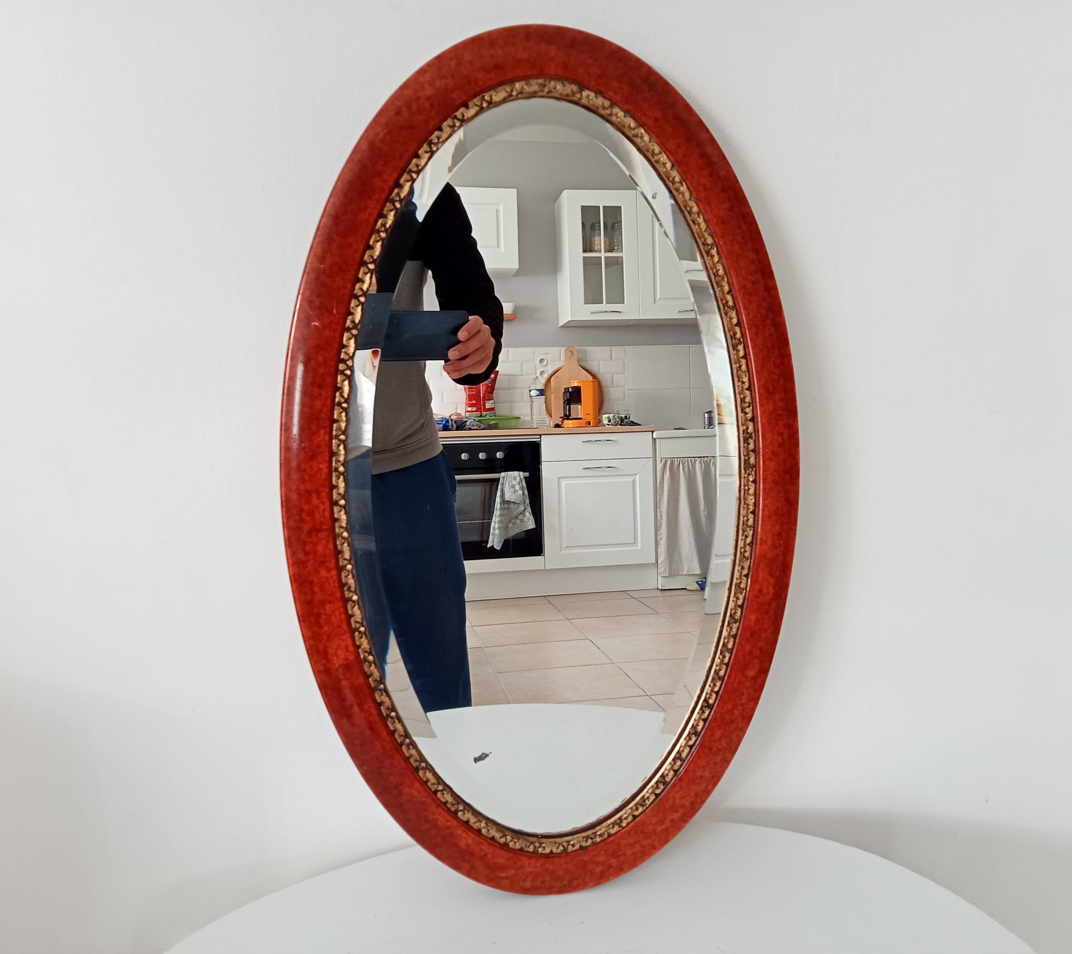 Antique oval mirror with bevelled glass