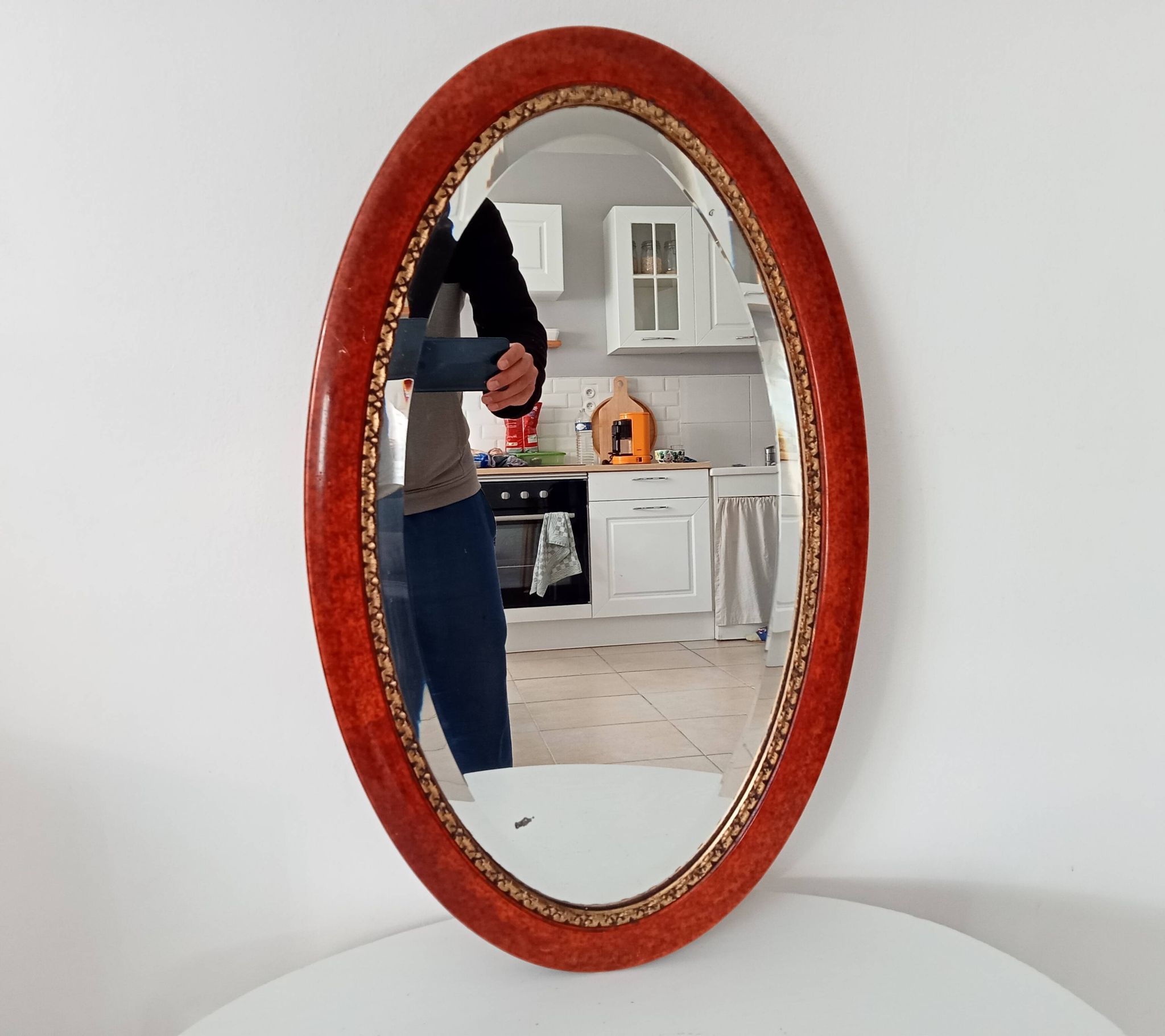 Antique oval mirror with bevelled glass