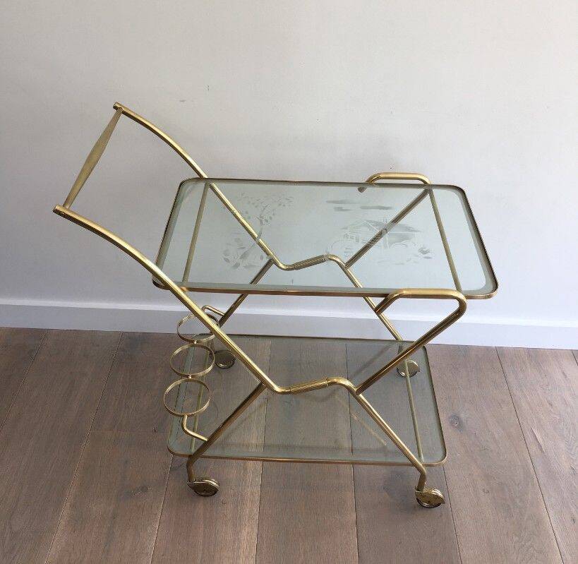 Italian designer rolling table in brass and engraved glass