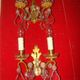 Pair of bronze and crystal wall lights with 2 arms of light