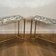 Pair of brass and antique mirror side tables from the Baguès house.