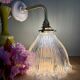 Elbow wall lamp with vintage holophane glass shade