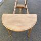Renovated round Art Deco dining table, extendable, made of solid oak, 145cm.
