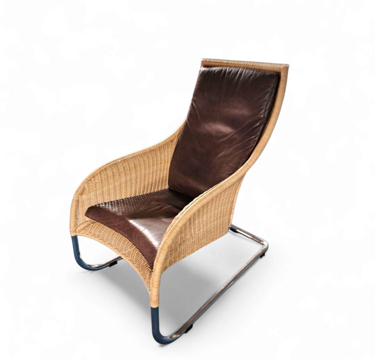 2 x Weighty rattan lounge chair / brown leather 1990s  Very good condition