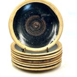 Pierre Digan 8 black stoneware plates from the 70s