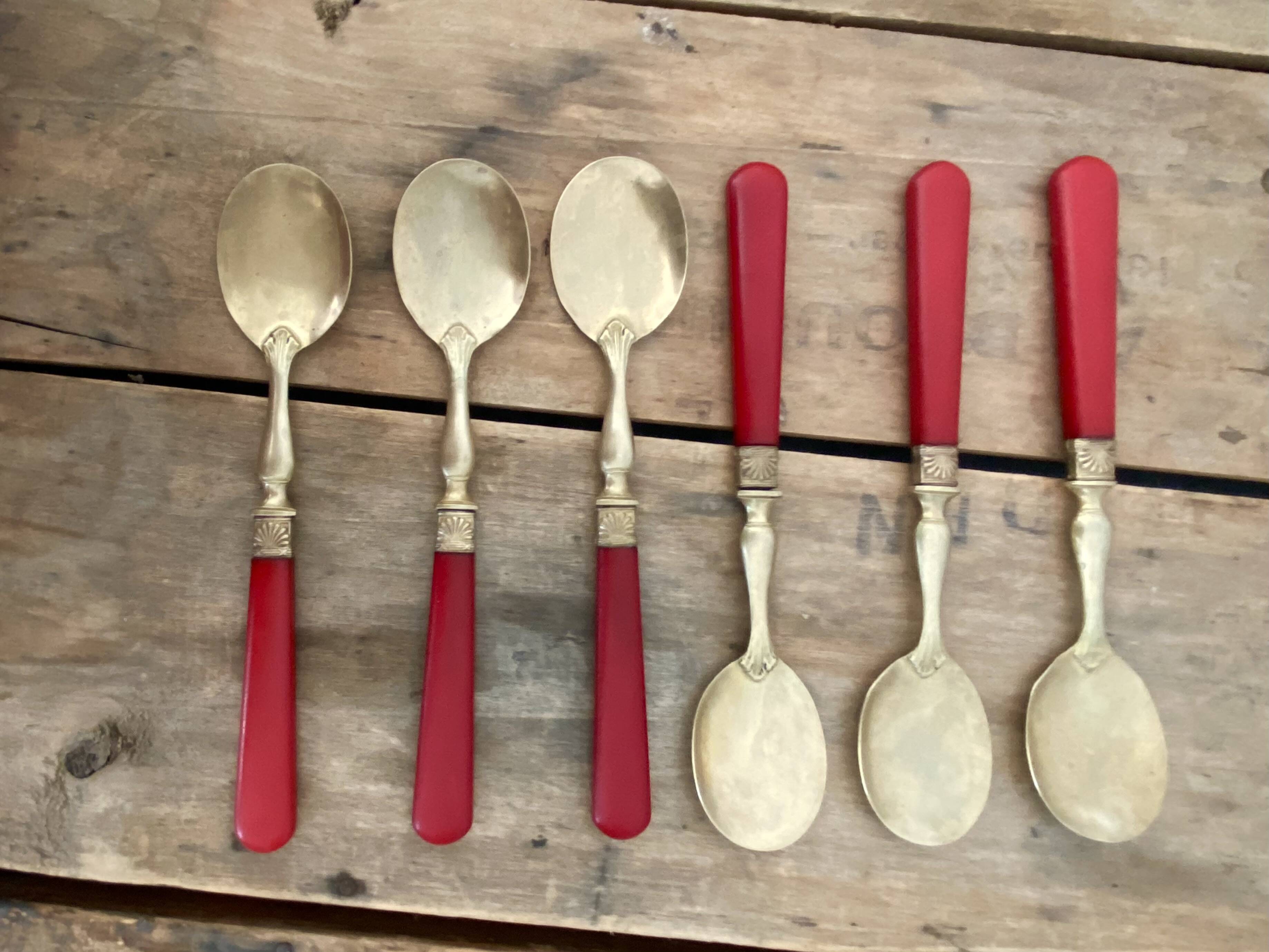 Six cuillères à glace en laiton et bakélite