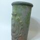 Vintage stone pot / vase with medallion