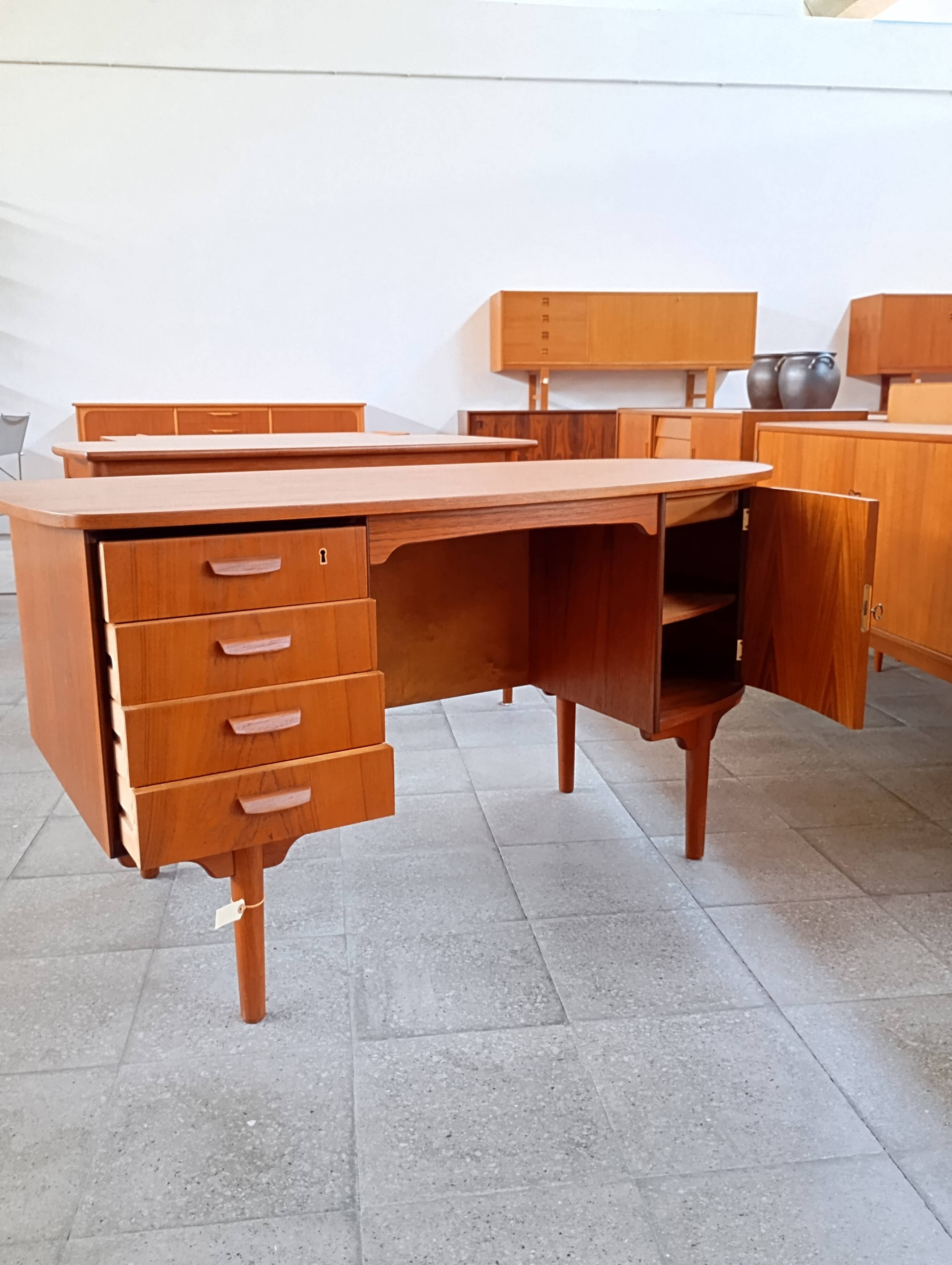 Scandinavian oval desk in teak from the 1960s.