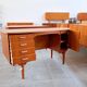 Scandinavian oval desk in teak from the 1960s.