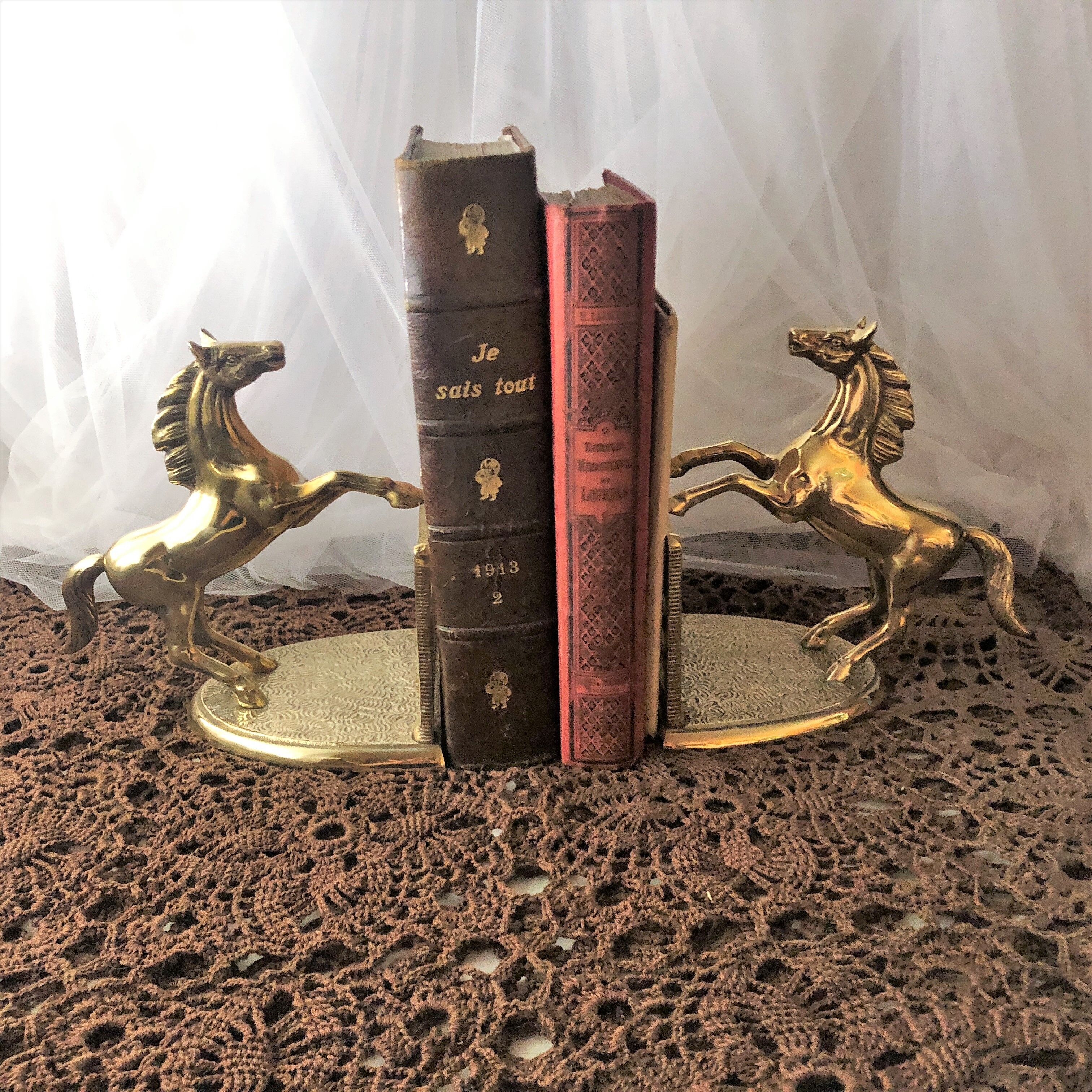 Goldeneye brass décor horses